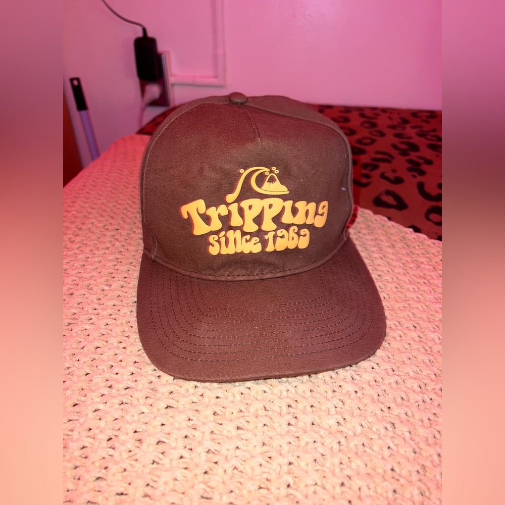 brown and yellow Quicksilver men’s hat